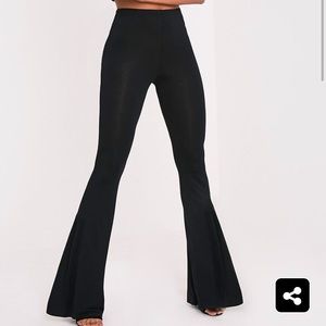 Black jersey flared pants